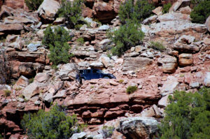 blue jeep navigating steep terrain on the Rimrocker Trail